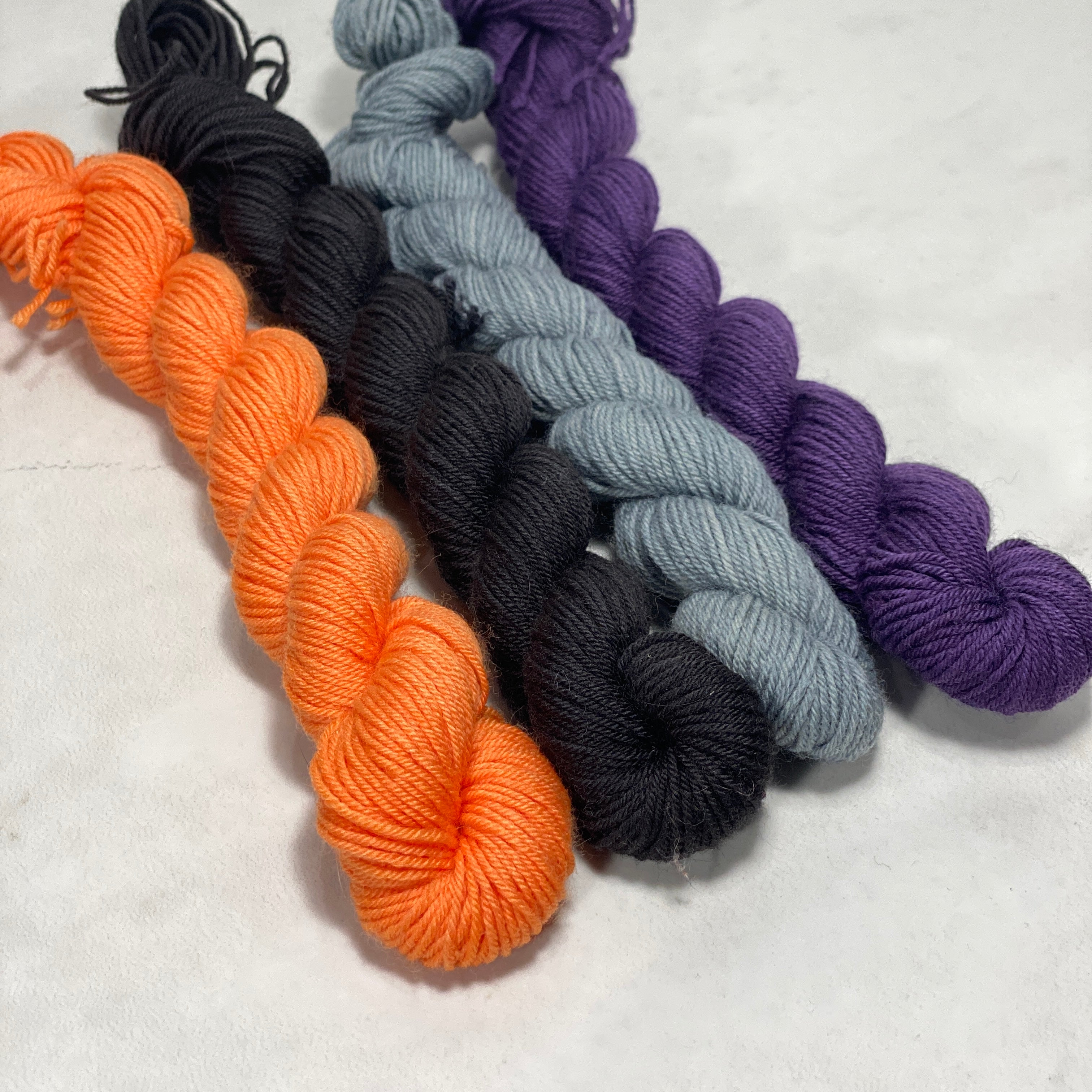 Merino Steel Sock - 4 Minis - Citrouille, Noirceur, Orage, Améthyste